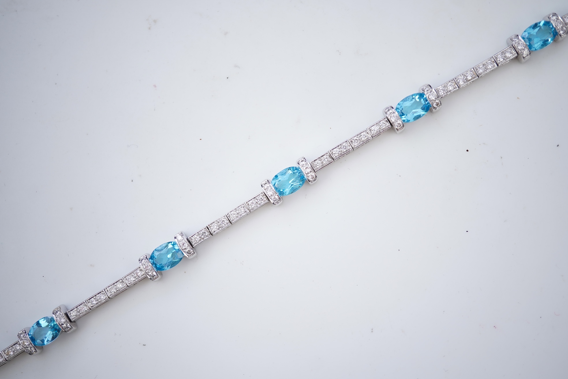 A blue topaz and diamond bracelet